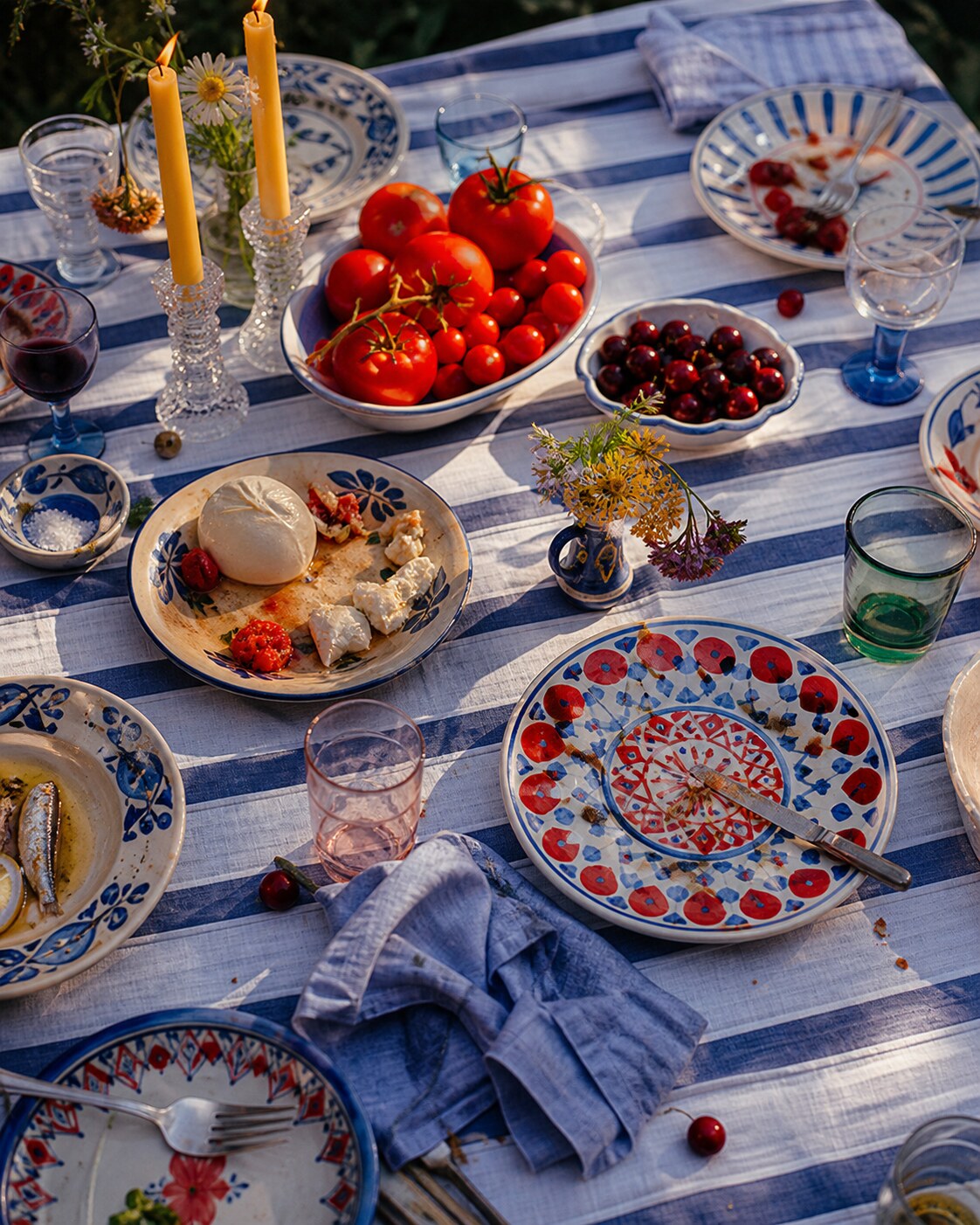 Italian summer table in blue, red and yellow